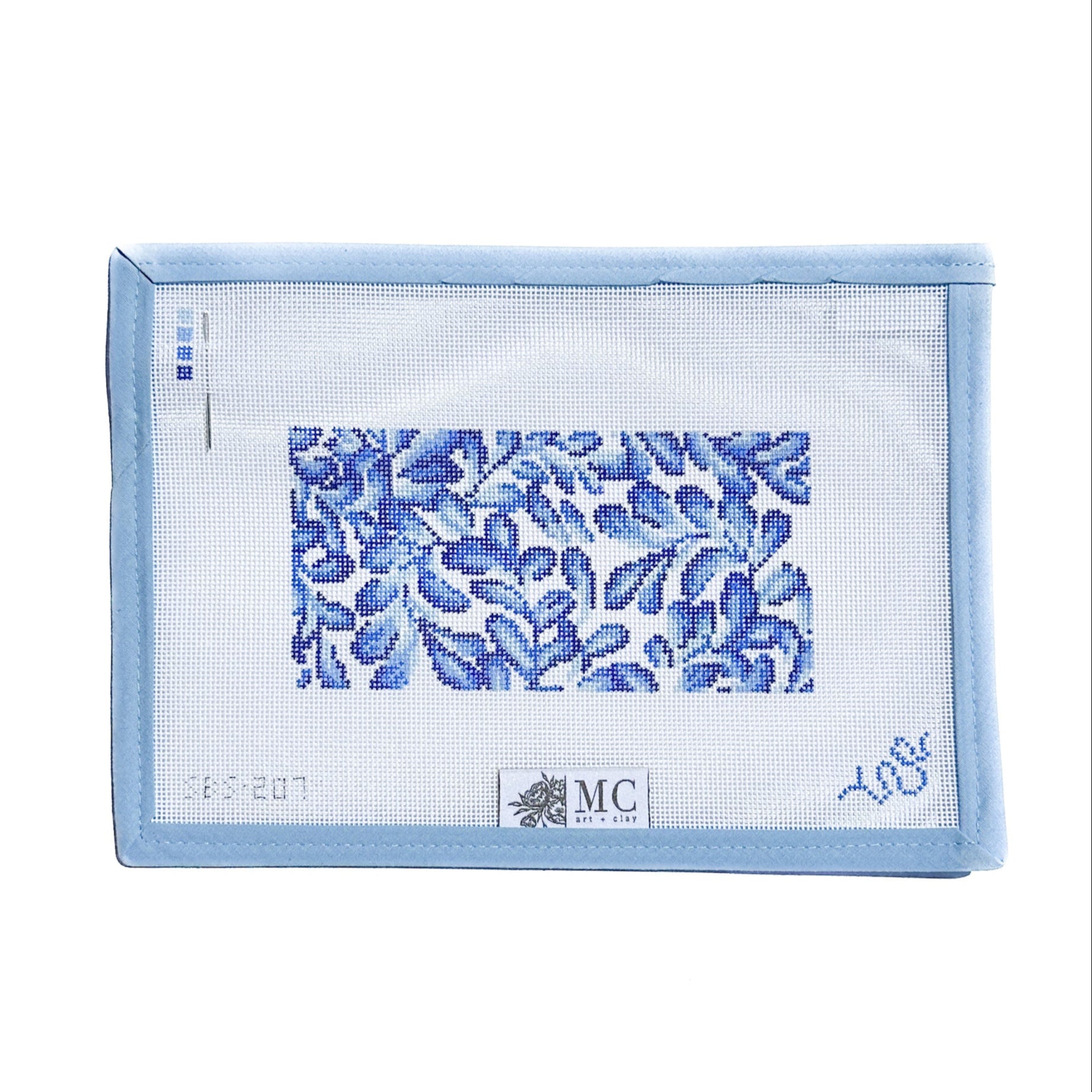 Blue and white needlepoint canvas